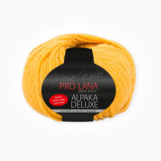 Wollknäuel Alpaka Deluxe in leuchtendem Gelb mit Etikett von Pro Lana.