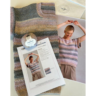 Pulloverzubehör mit Anleitung und gemusterter Strickseite.