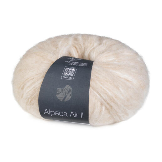 Helles Wollknäuel Alpaca Air II von LG mit Etikett.