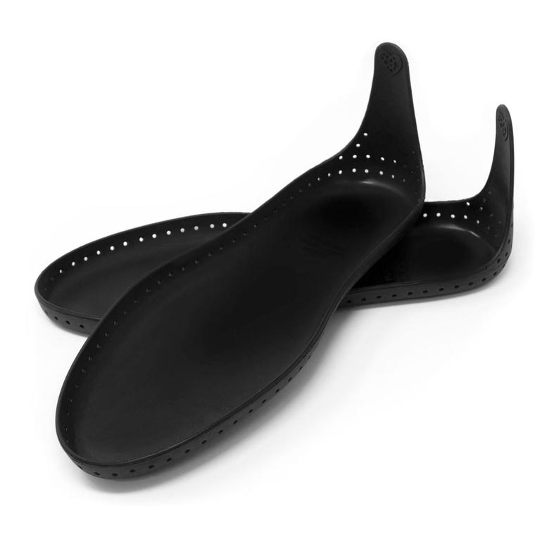 Zwei schwarze Botties®-Laufsohlen aus flexiblem Material.