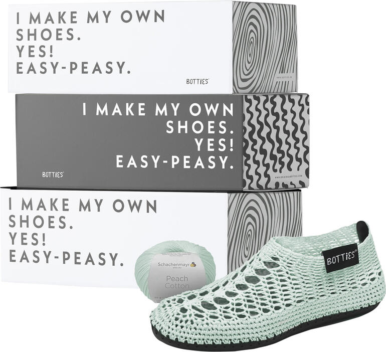 Starter-Set für Häkelbotties in mintgrün mit Verpackung.