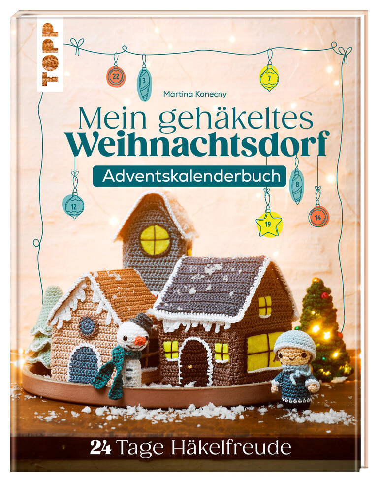Adventskalenderbuch mit einem gehäkelten Weihnachtsdorf und Figuren in warmen Farben.