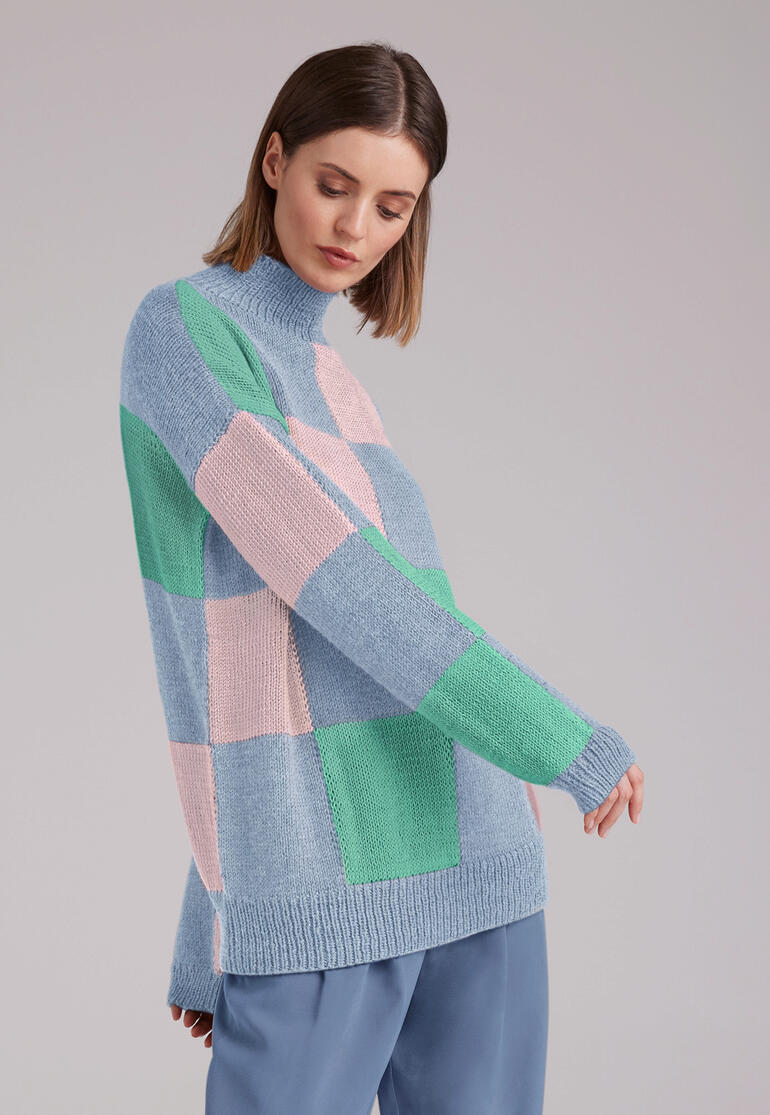 Gestreifter Pullover aus Nuovo Merino 120 in Blau, Rosa und Grün.