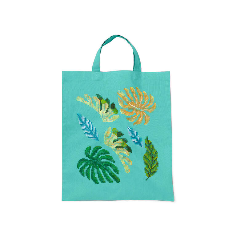 Baumwolltasche mit bunten Palmblättern auf türkisem Hintergrund