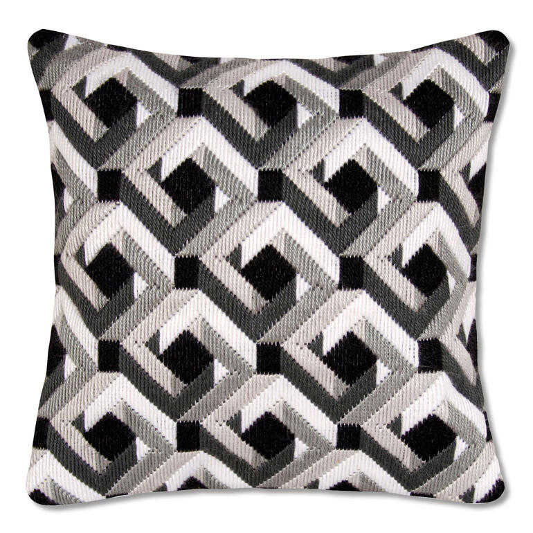 Kissen mit einem geometrischen Schwarz-Weiß-Muster.