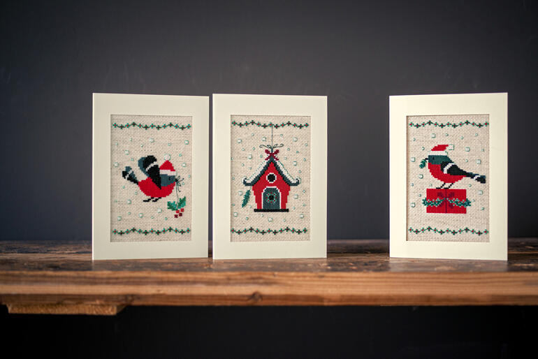 Drei Weihnachtskarten mit verschiedenen Vogelmotiven im Set.