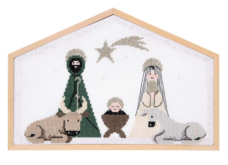 Kreuzstichbild einer Krippe mit Maria, Josef und dem Kind in einem Stall